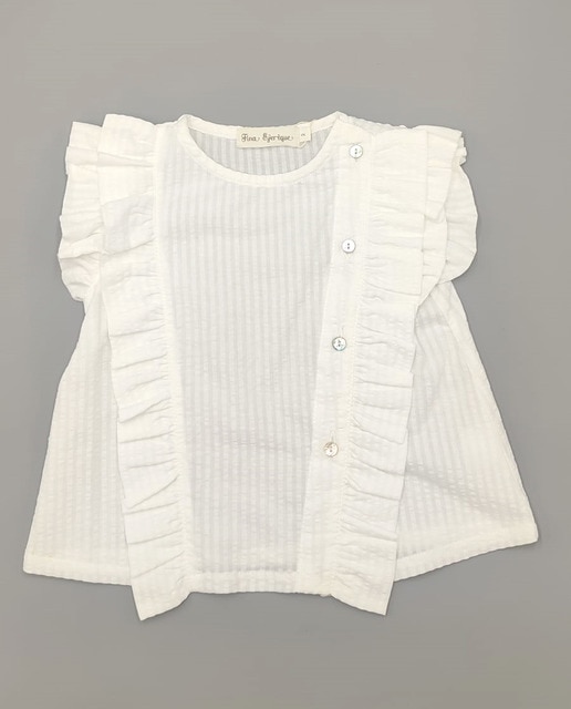 Blusa con volante
