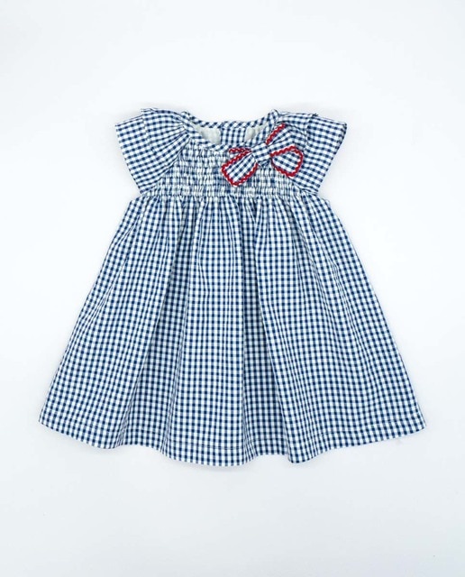 Vestido con gomas y volante
