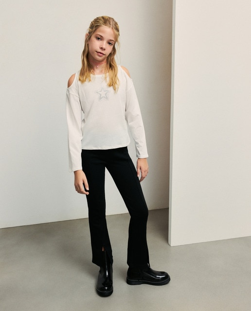 Legging flare de niña con aberturas en bajo