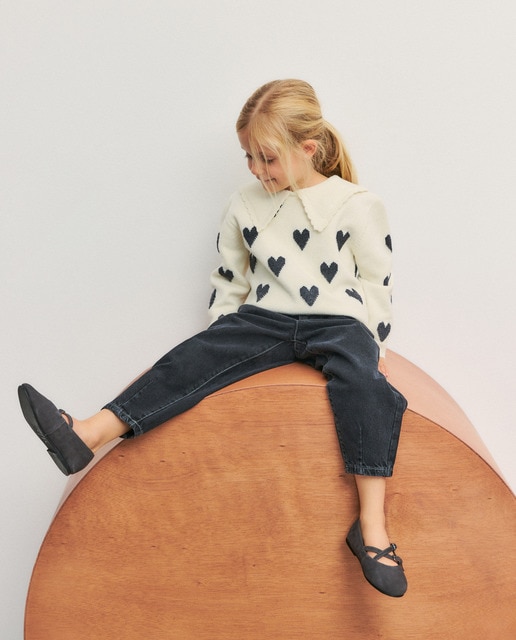 Jersey de niña con aplique tipo lazo