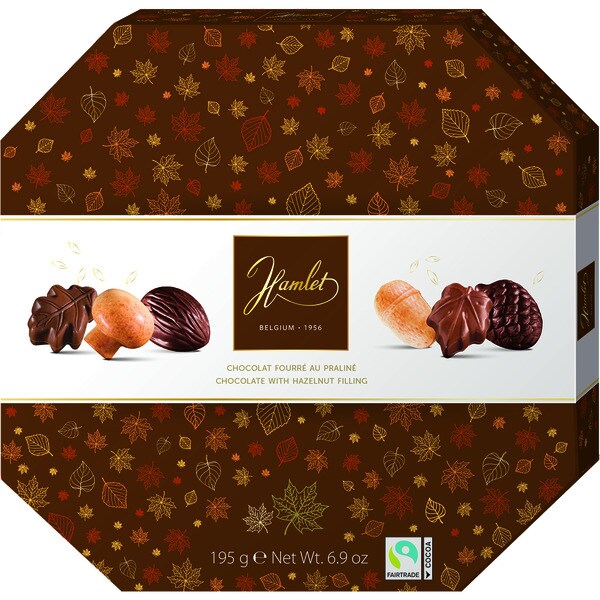 assorted chocolate pralines filled with hazelnuts in autumnal shapes case 195 g