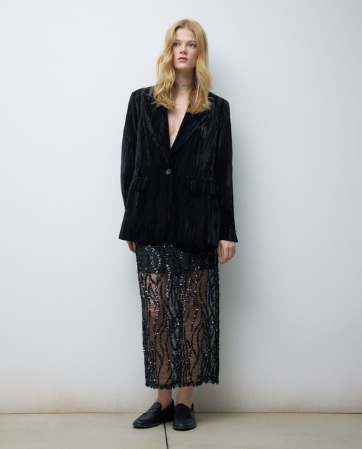 Falda midi con transparecias y lentejuelas