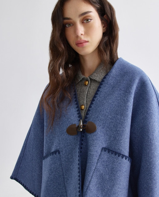 Capa con borde con pespunte