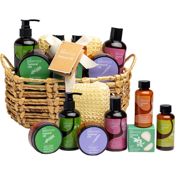 Cesta regalo Natural Oil con exfoliante corporal, gel ducha, sales baño, loción corporal, acondicionador y champú camomila