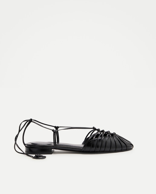 Tintoretto - Zapatos planos de mujer con nudos.
