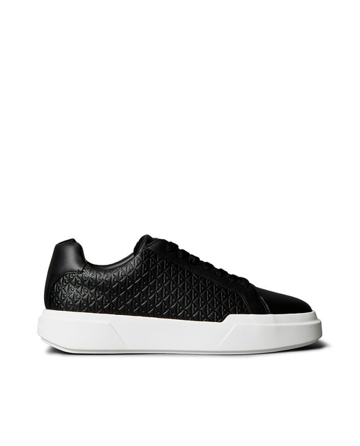 Calvin Klein - Zapatilla deportiva casual de piel con estampado monogram.