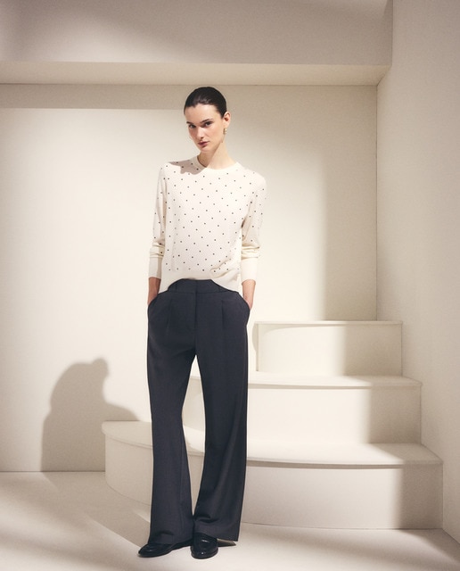 Woman El Corte Inglés - Jersey de mujer cuello caja tachas all over.