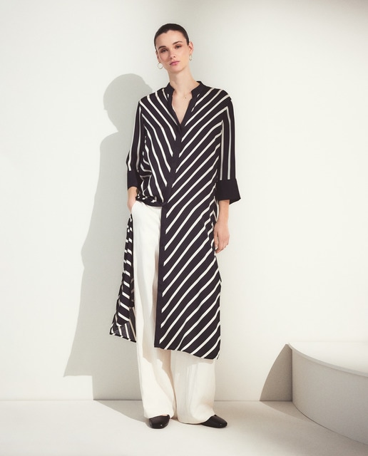 Woman El Corte Inglés - Vestido de manga larga y estampado de rayas.