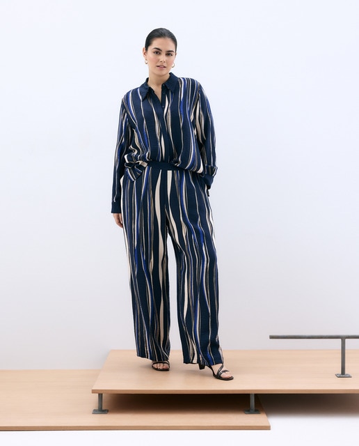 Couchel - Pantalón fluído estampado de mujer.
