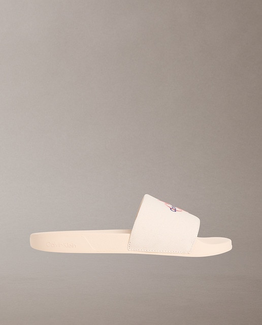 Calvin Klein - Chjanclas de mujer de lona con logo.