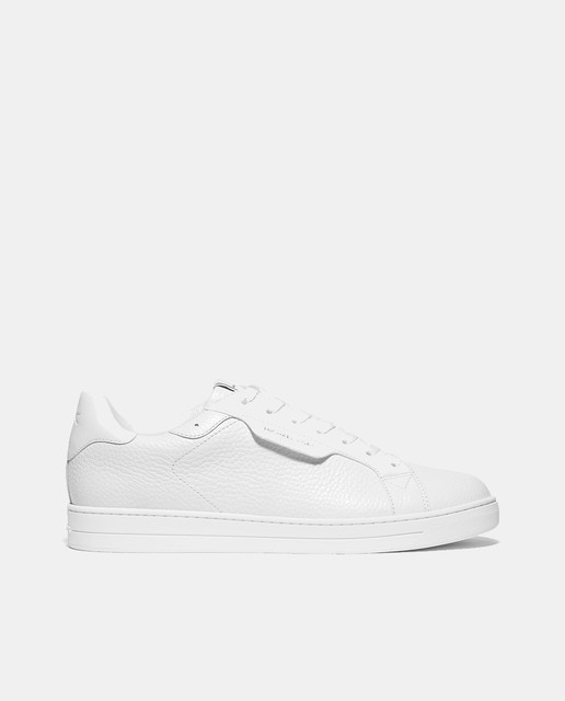 Michael Kors - Zapatilla de hombre keating en piel y solapa lateral con logo.