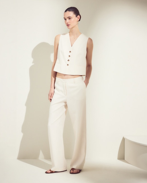 Woman El Corte Inglés - Pantalón ancho liso de mujer de crinkle.