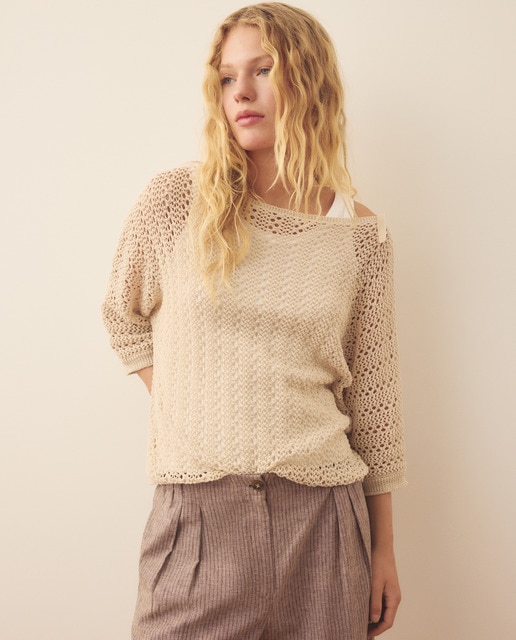 Southern Cotton - Jersey calado de mujer asimétrico.