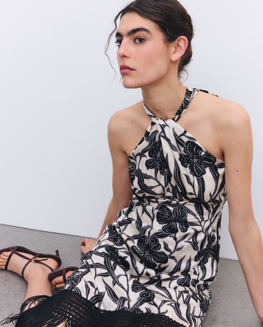 Tintoretto - Vestido con flecos y cuello halter.