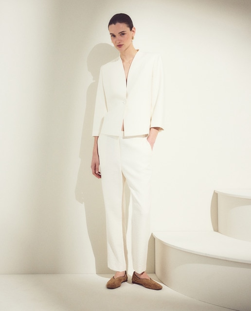 Woman El Corte Inglés - Pantalón liso de mujer de crinkle.