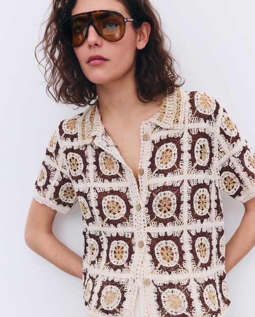 Tintoretto - Jersey de mujer en crochet fantasía y manga corta.