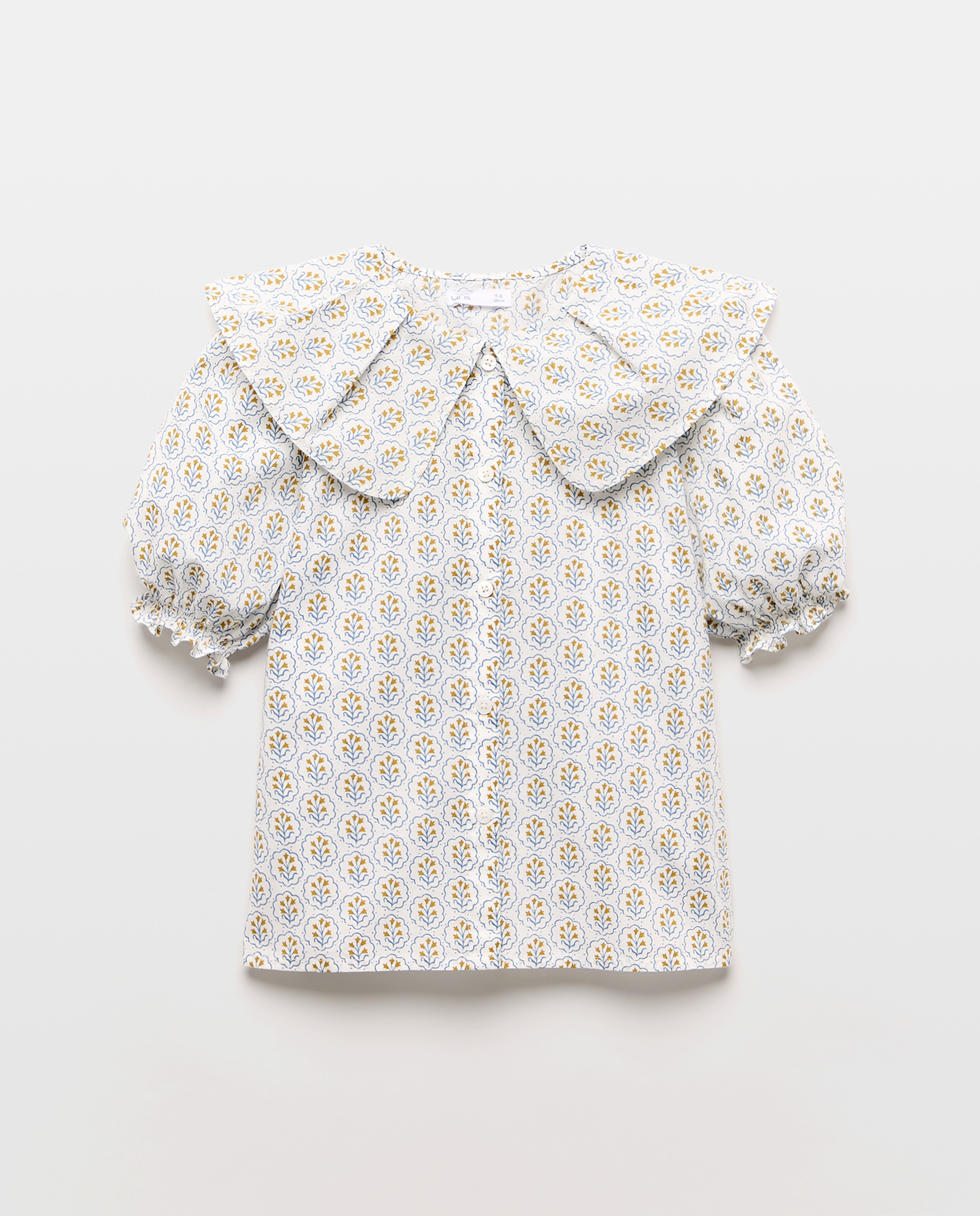 Imagen 0 de Blusa niña cuello volante manga corta