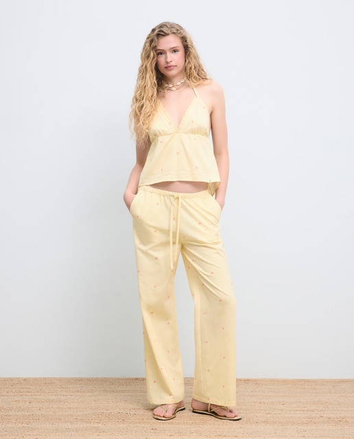 Pantalón ancho de mujer con rayas bordado