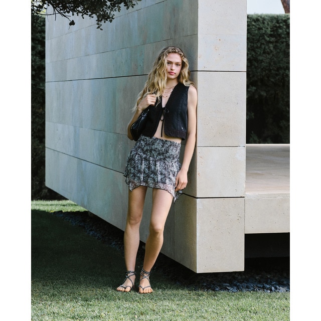 Green Coast - Falda corta de gomas.