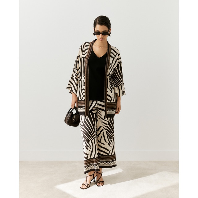 Couchel - Pantalón fluido de mujer con estampado blanco y negro.